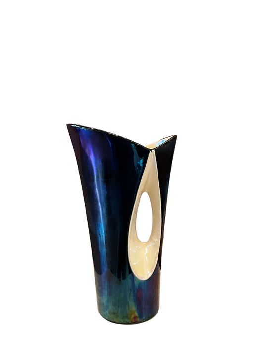 Mid-century ceramic vase by The Vault Creative with a sleek, minimalist design and neutral tones, perfect for modern decor.