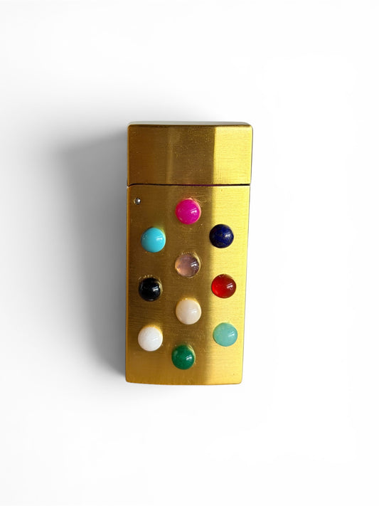 Multi-color Stoner Lighter by P. Grunsfeld, featuring vibrant design and compact size, from The Vault Creative.