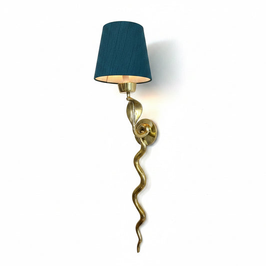 Pair of vintage brass snake wall sconces by The Vault Creative, featuring intricate snake-shaped design and antique brass finish.