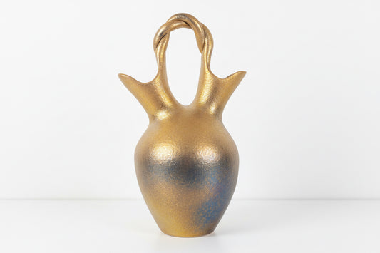 Native American wedding vase with intricate patterns, handcrafted ceramic design by The Vault Creative.