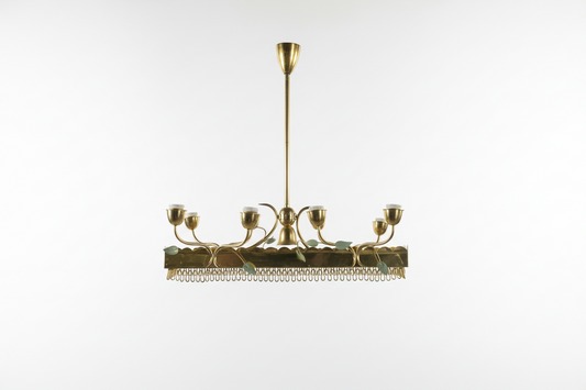 Vintage French Leaves Pendant Light by The Vault Creative featuring intricate leaf design and warm metal finish.