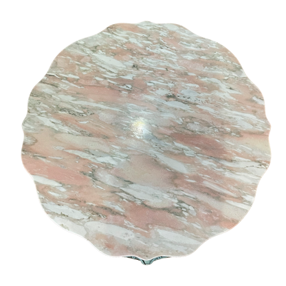 Pink marble coffee table by Ozmun Home with sleek modern design and polished surface, perfect for contemporary living rooms.