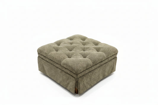 leopard tufted ottoman on a white background