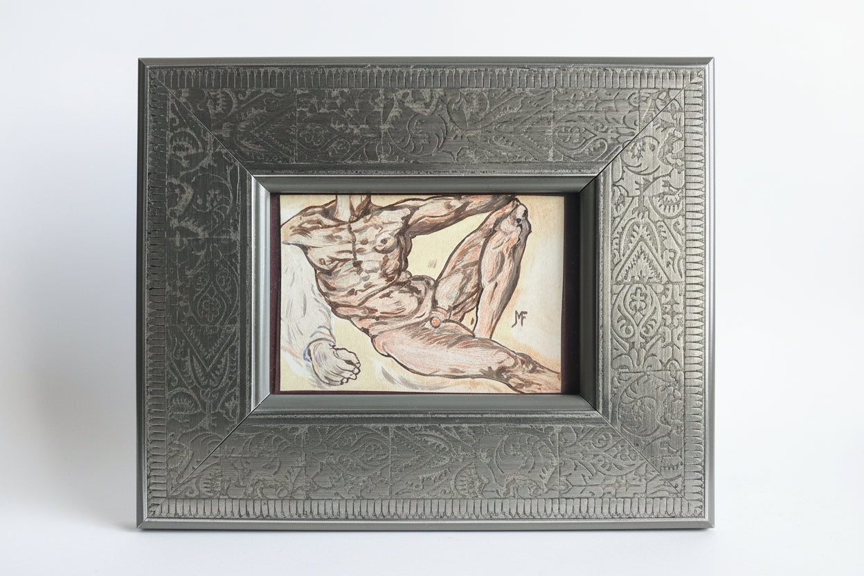 Framed artwork of a muscular figure on a dark textured wall