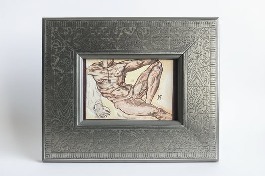 Framed artwork of a muscular figure on a dark textured wall