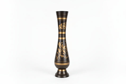 Decorative vase with black and gold design on a white background