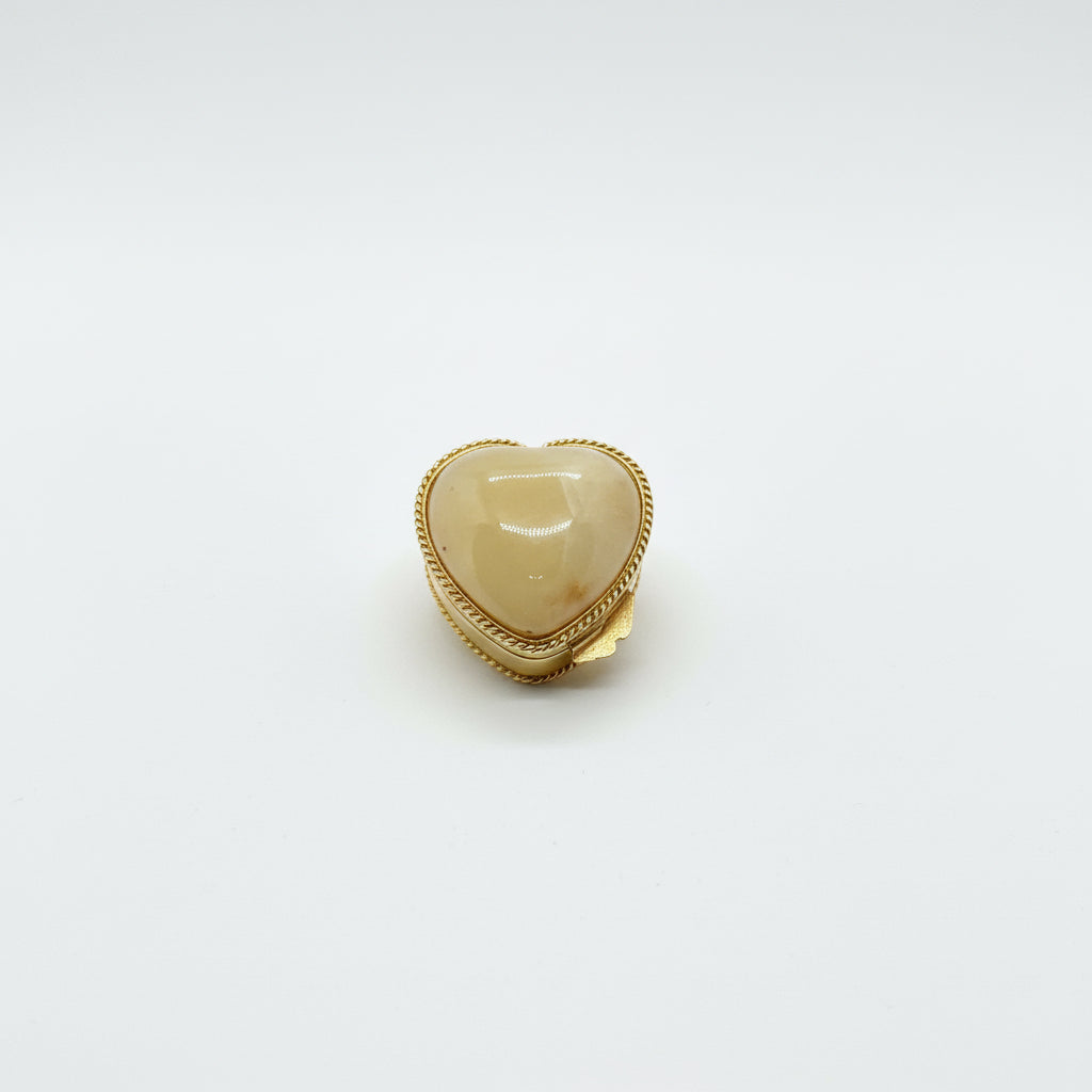 Heart-shaped box with gold frame 