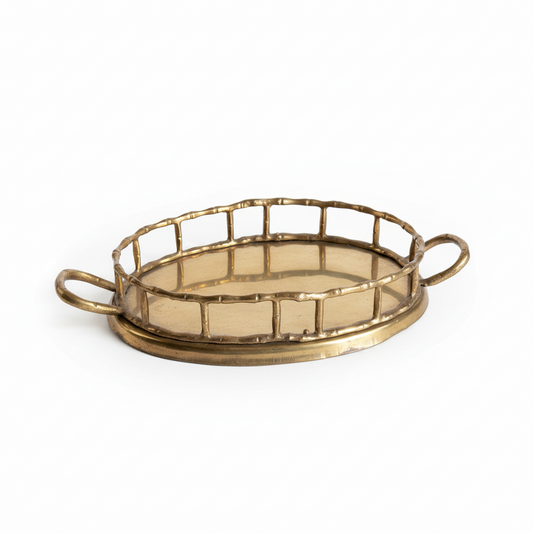 Gold decorative tray with handles on a white background