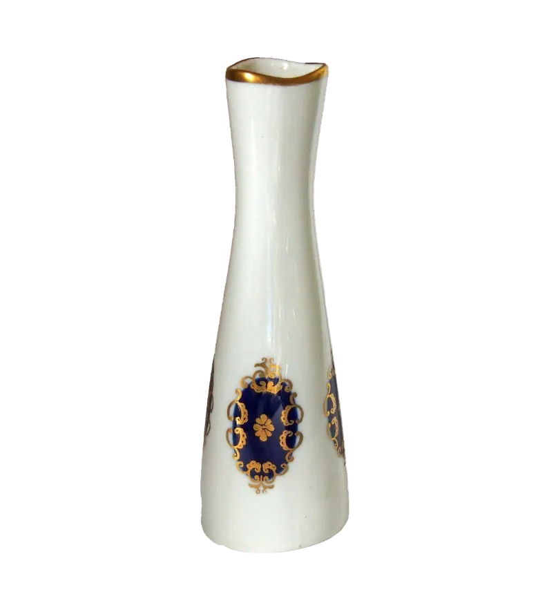 White vase with gold and blue decorative elements on a white background