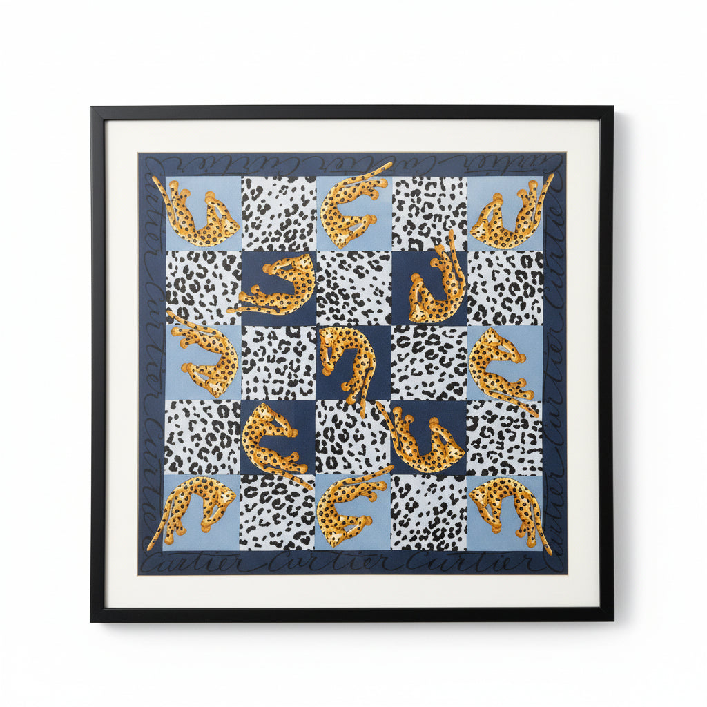 Framed artwork with geometric pattern and text on a beige wall