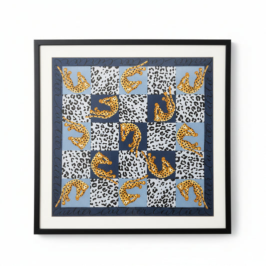 Framed artwork with geometric pattern and text on a beige wall