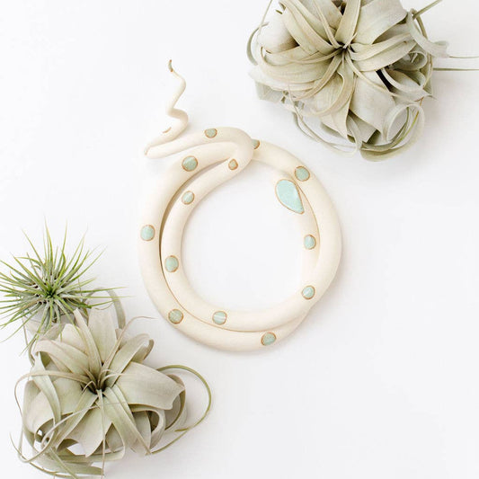 Large ceramic snake sculpture by Carter & Rose, featuring detailed textured scales and a realistic coiled design.