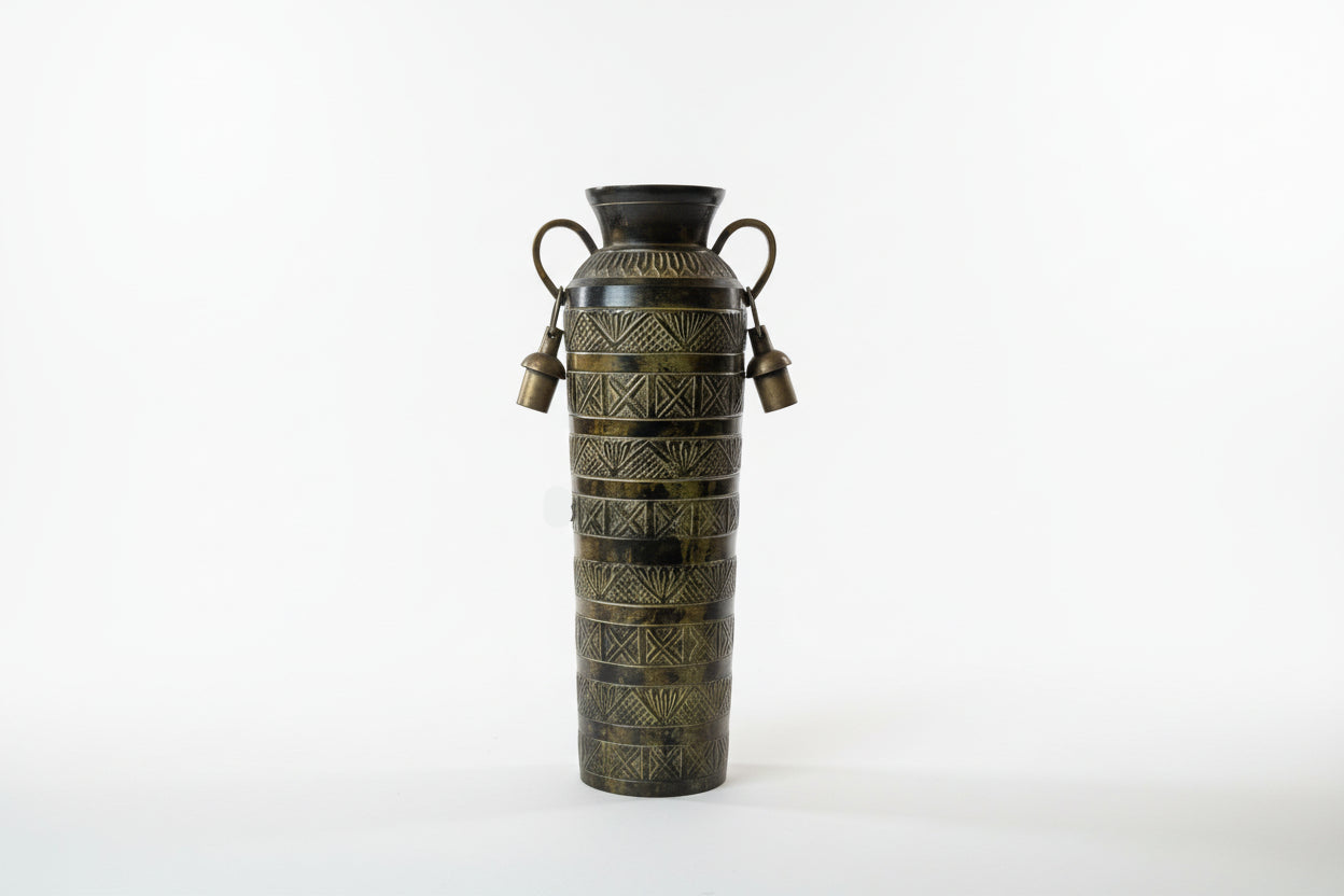 Decorative vase with intricate patterns on a white background