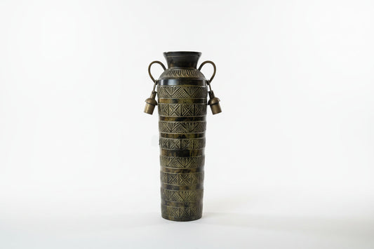 Decorative vase with intricate patterns on a white background