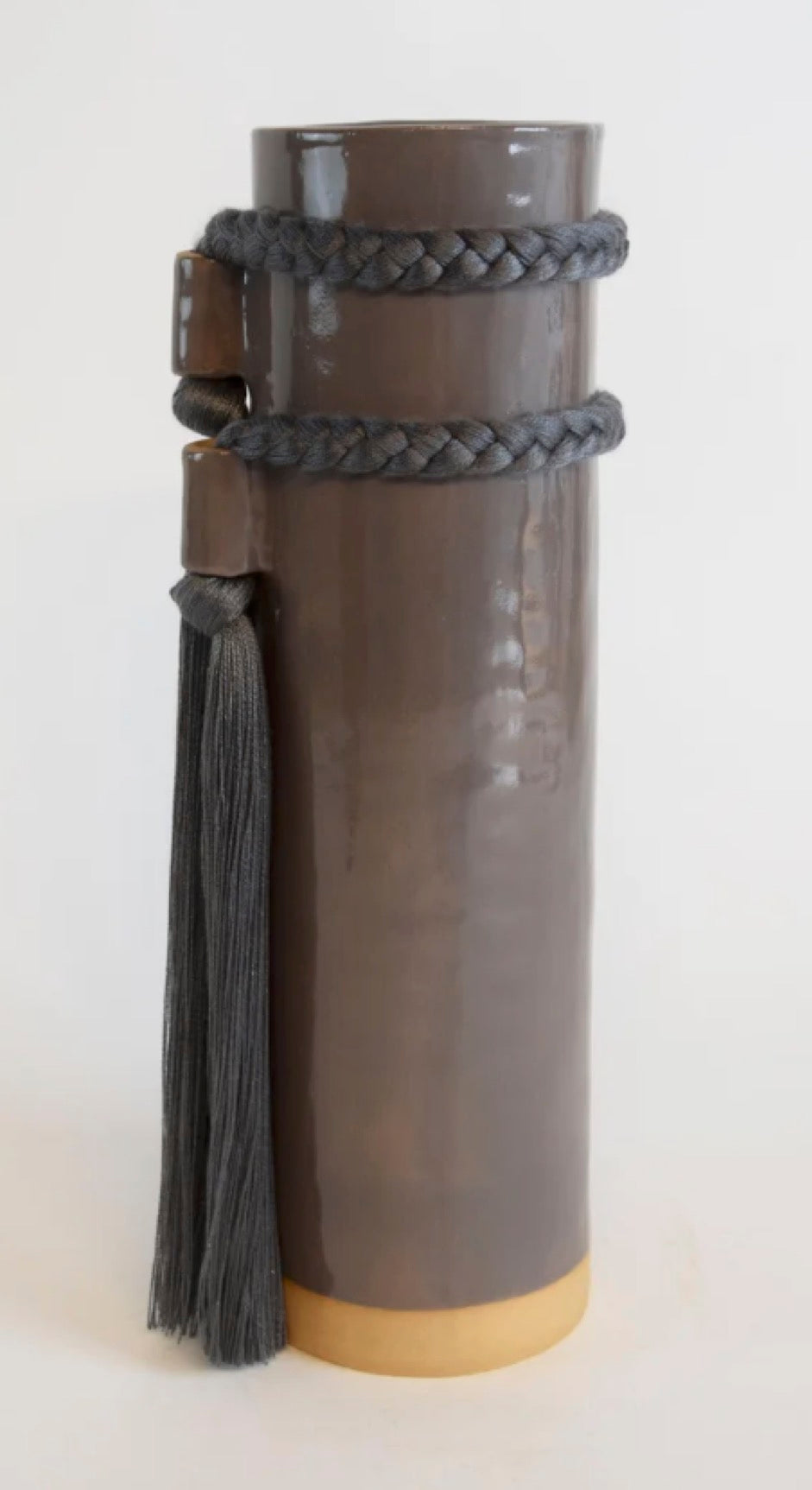 Karen Tinney Charcoal Vase by The Vault Creative, round ceramic vase with a matte charcoal gray finish, shown on a neutral background.