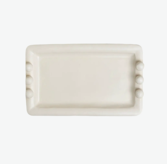 Rectangular ceramic soap dish with decorative elements on a white background