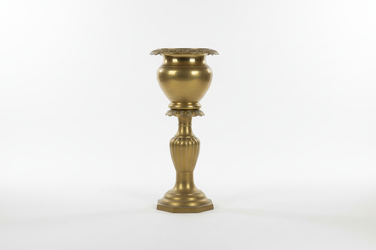 Gold ornate vase on a white background
